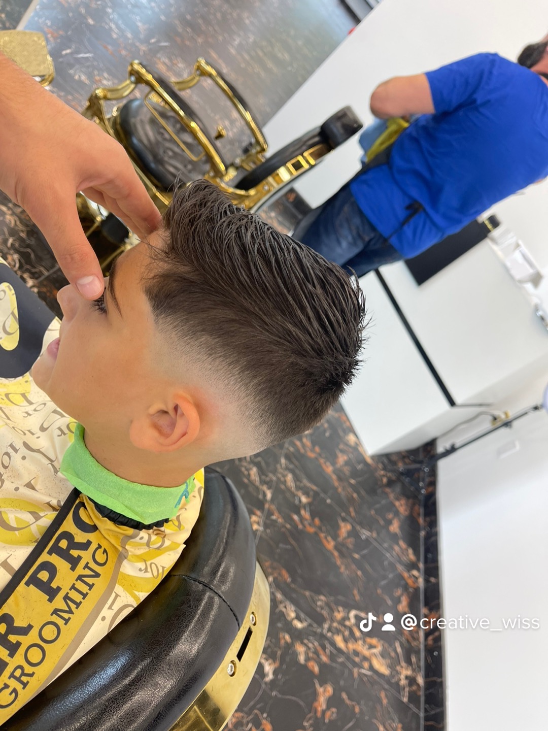 Kids comb over with mid fade